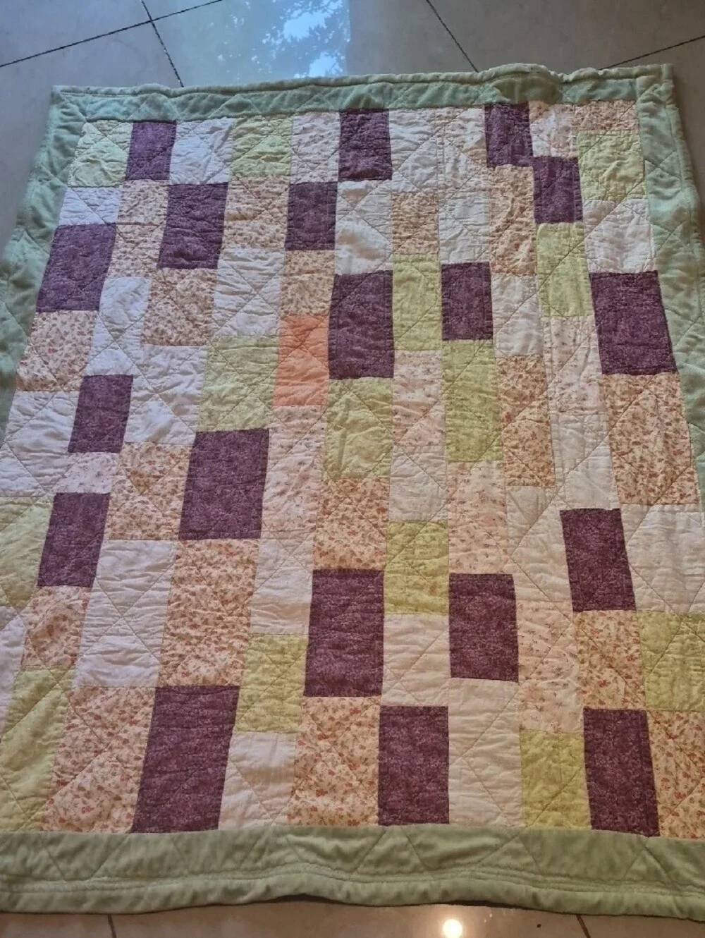 Patchwork Quilt in Purple, Green, and Cream - Cozy Floral Block Design